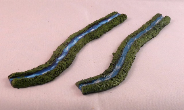 Home made and painted stream section (left) versus commercial (right)